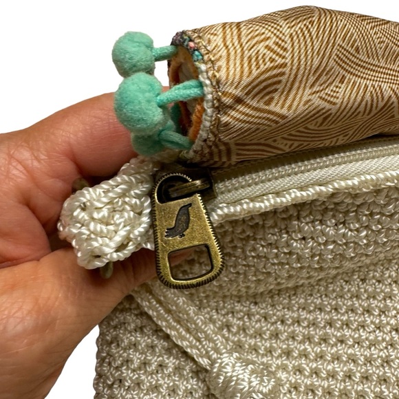 Sakroots Beige Women's Crochet Peace Crossbody Purse Bag Pom Pom Flap - Picture 6 of 8